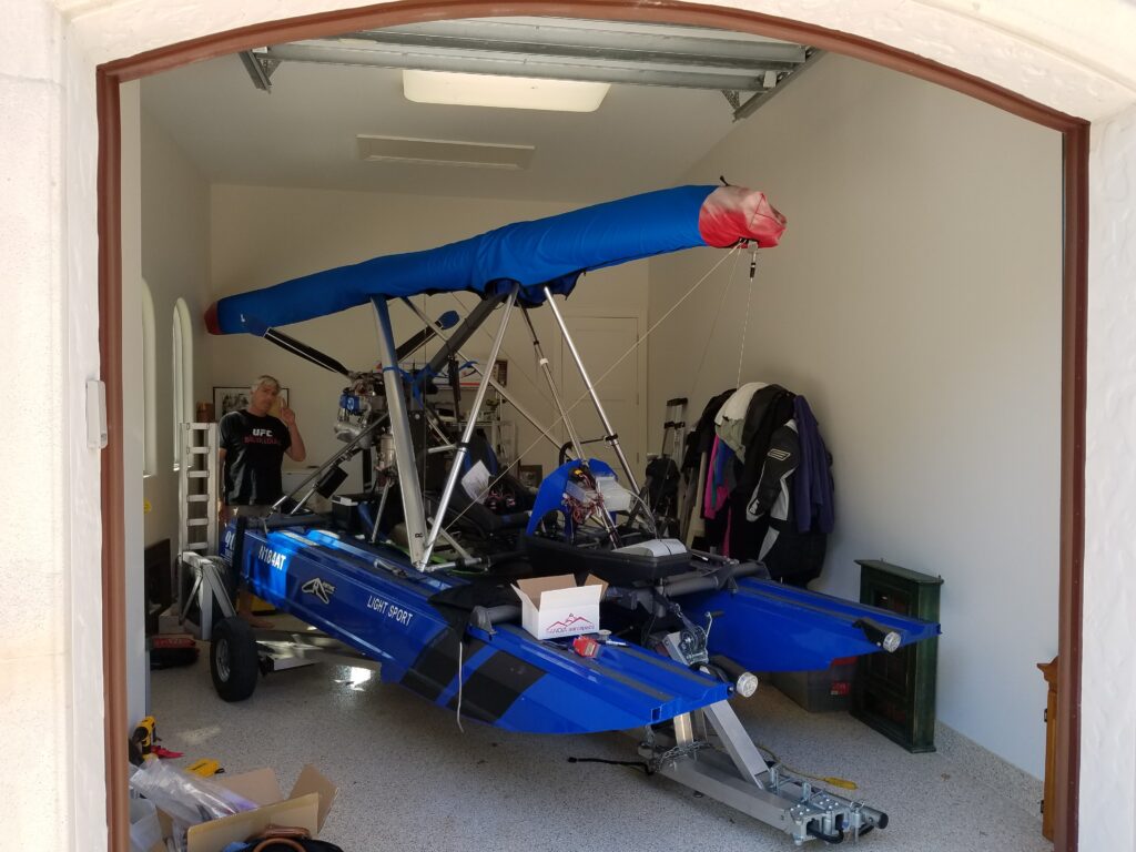 Cygnet aircraft on trailer inside residential garage